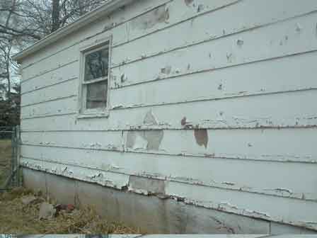Deteriorated Composition Board Lap
Siding